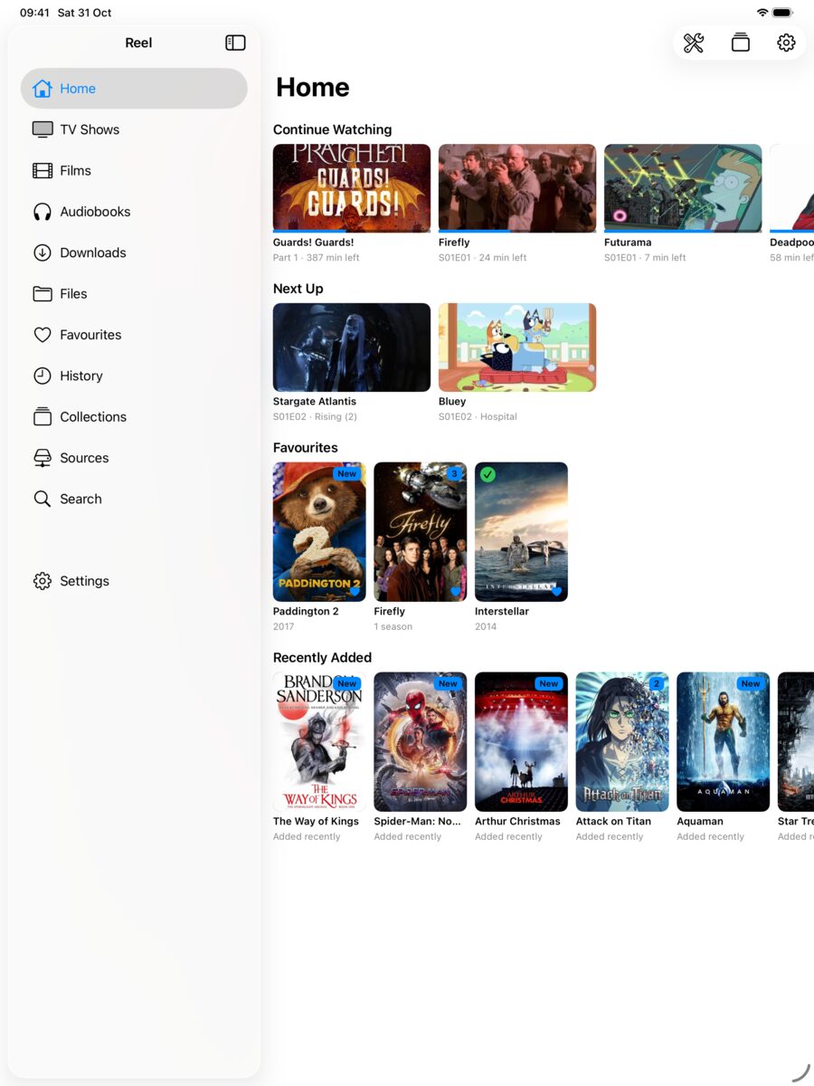 Home on iPad: Continue Watching, Next Up, Favourites and Recently Added rows with posters